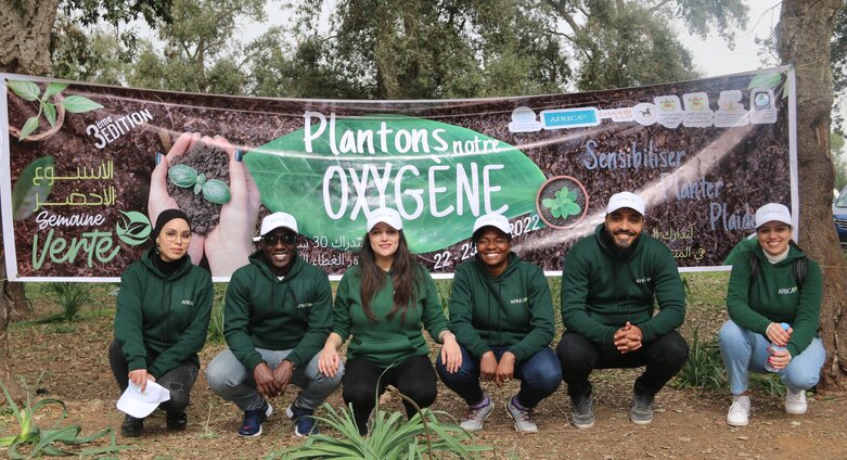 Saving the planet: Africa50 staff plant trees to commemorate Green Week